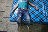 پیکر کودک قربانی جنگ در شهر "دوما" سوریه. اکتبر 2016