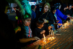آیین گل مالی و شمع زنی عرب های مقیم بوشهر در شب عاشورای حسینی